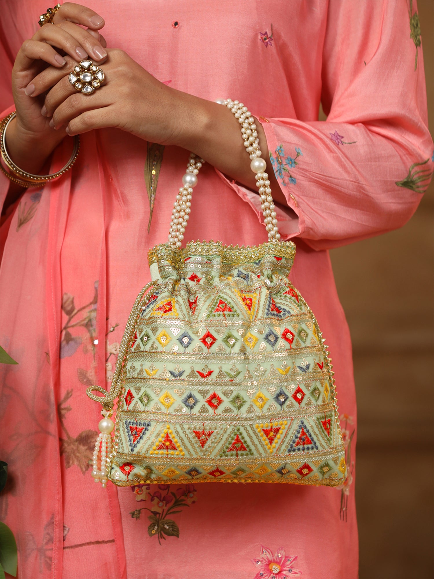 Yellow Chimes potli bag - stylish accessory for parties