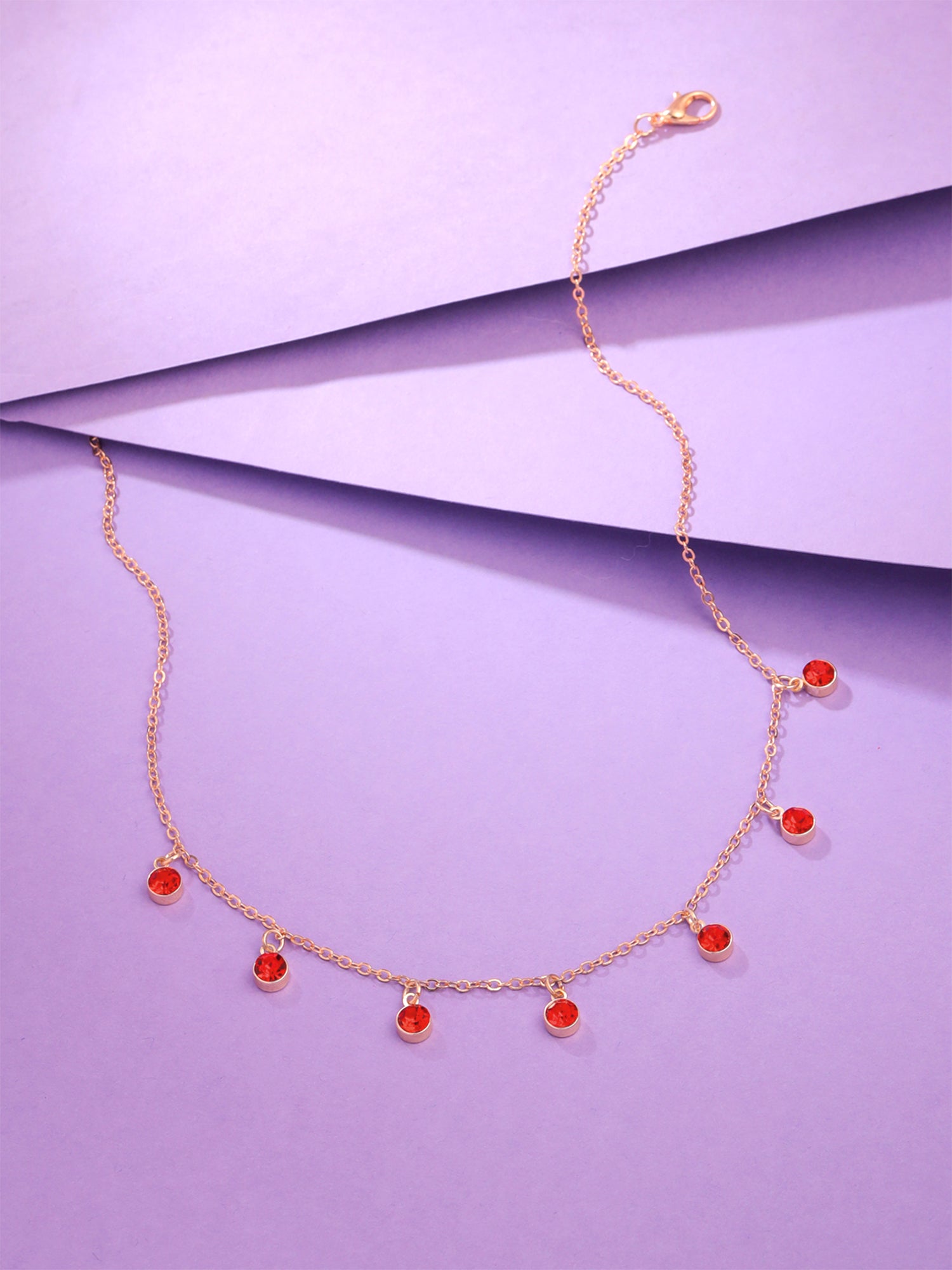 Yellow Chimes red stone necklace - for elegant evening wear