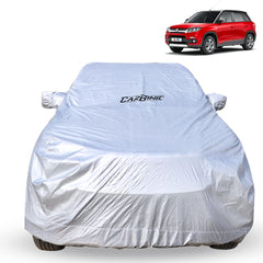CARBINIC Car Cover for Maruti Brezza 2022 Waterproof (Tested) and Dustproof Custom Fit UV Heat Resistant Outdoor Protection with Triple Stitched Fully Elastic Surface | Jungle with Pockets (Silver)