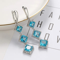 Yellow Chimes Elegant Latest Fashion Silver Plated Blue Crystal Drop Dangler Earrings for Women and Girls, Silver, Blue, Medium (Model Number: YCFJER-607CRLDRP-BL)